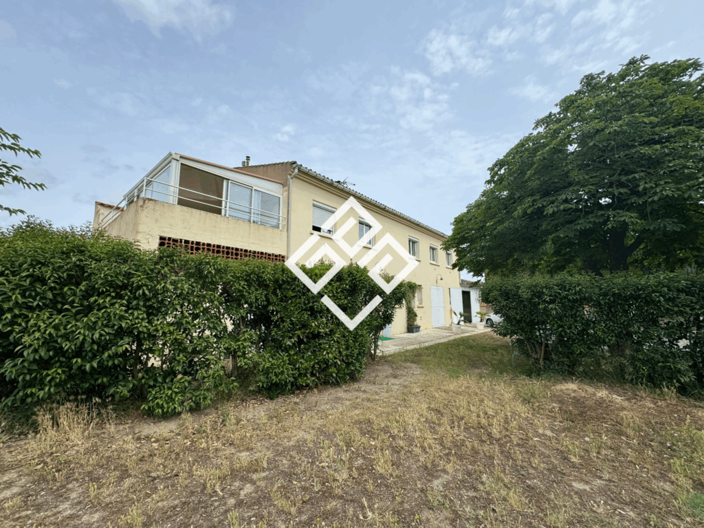 Maison 120m2 avec grand garage et terrain constructible